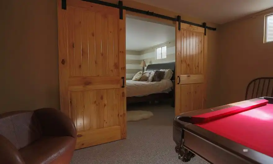Cozy basement sliding barn door