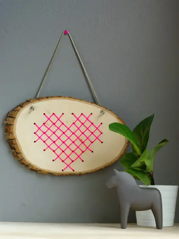 Cross stitch heart in wood