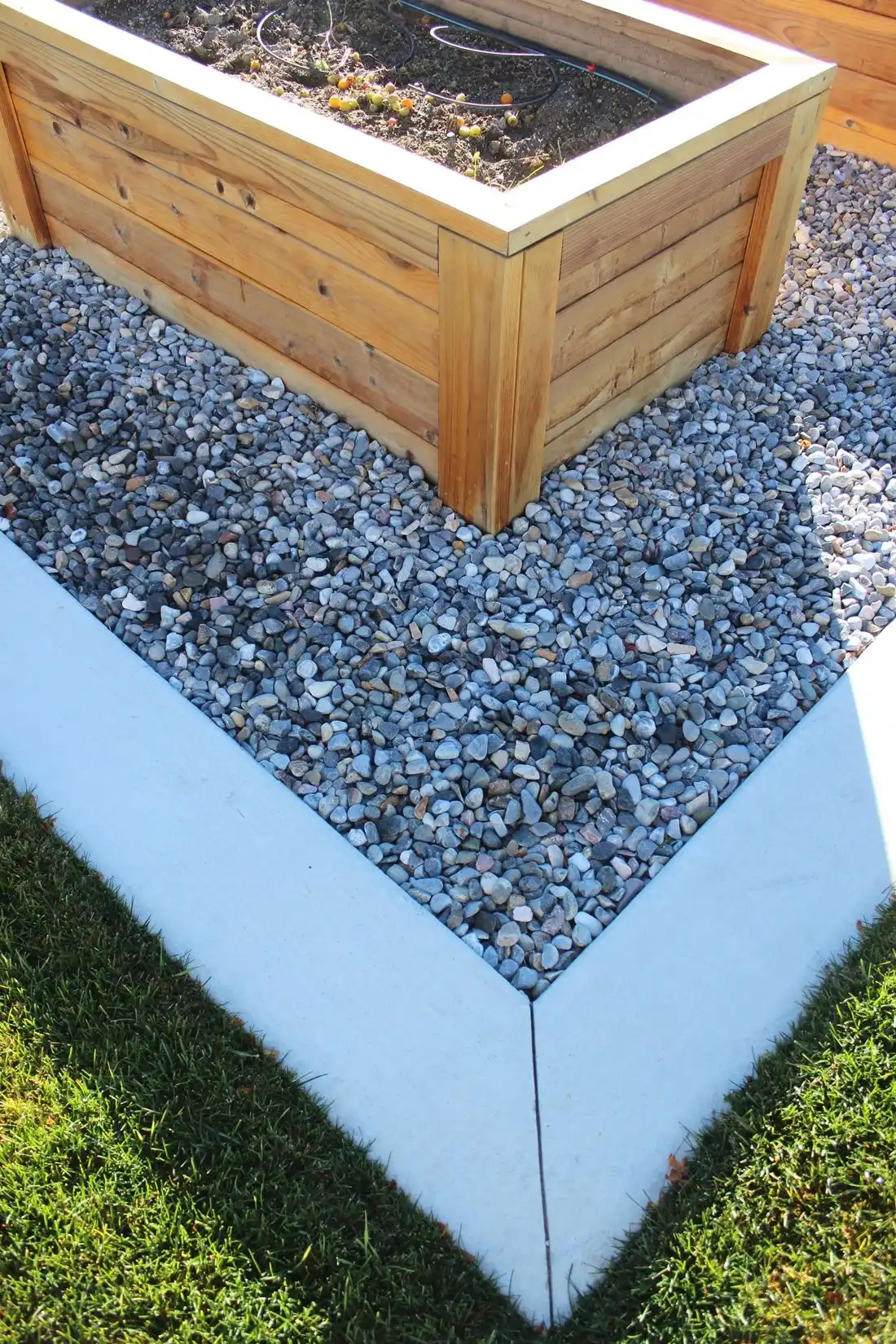 Curb Appeal - wood planters and river rocks