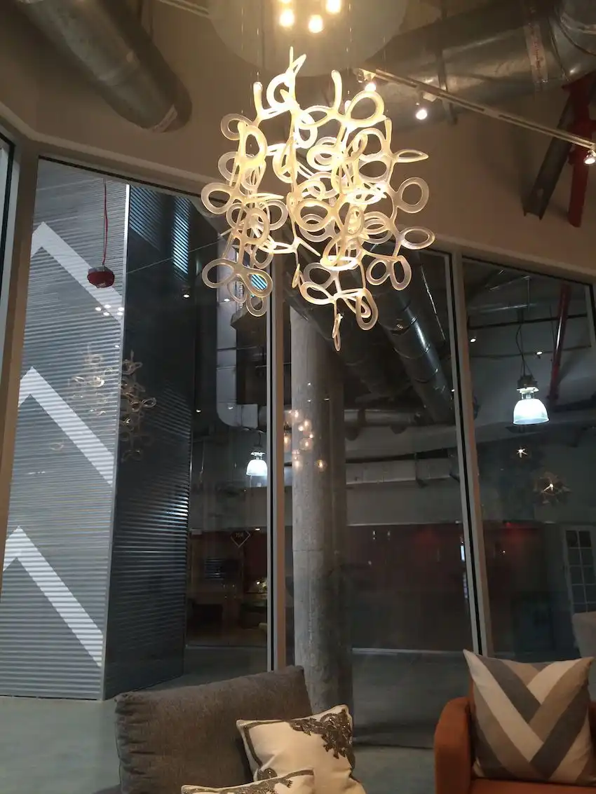 Curly lucite chandelier from Oggeti