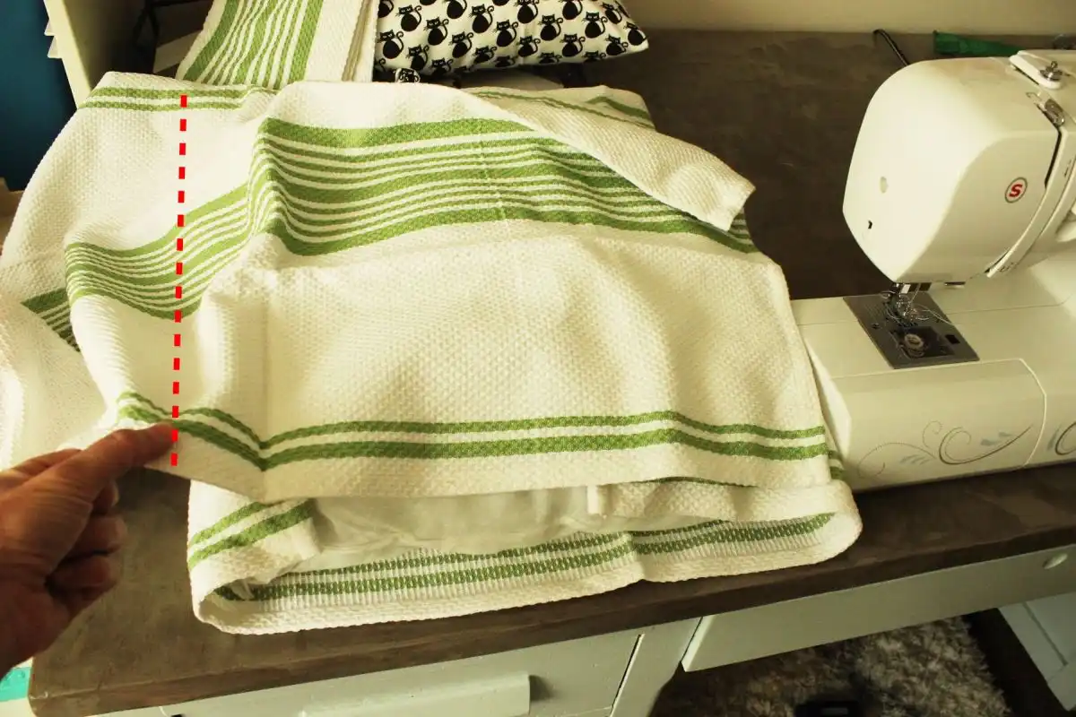 DIY Dish Towel Pillows Wrap the pillow with the first towel as much as you can