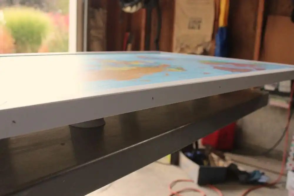DIY Framed Map Corkboard - nails