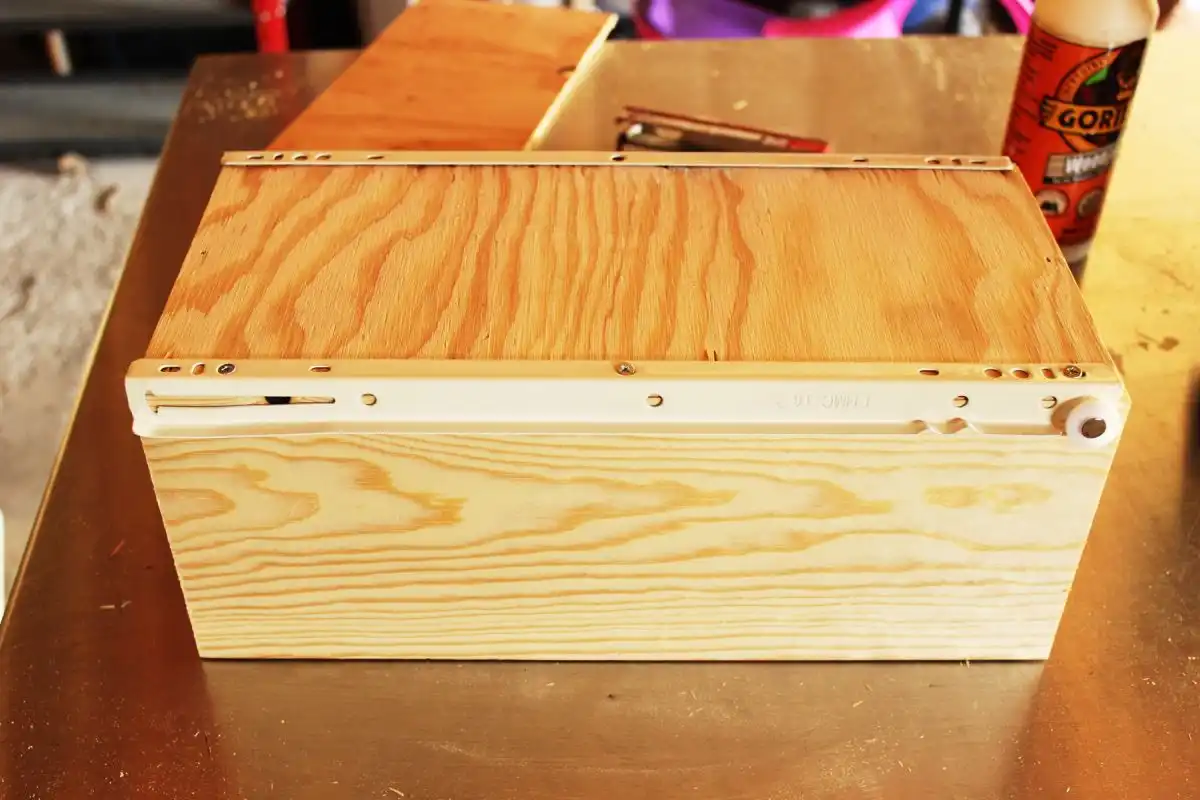 DIY Modern Wooden Dresser Attach the drawer slide with screws