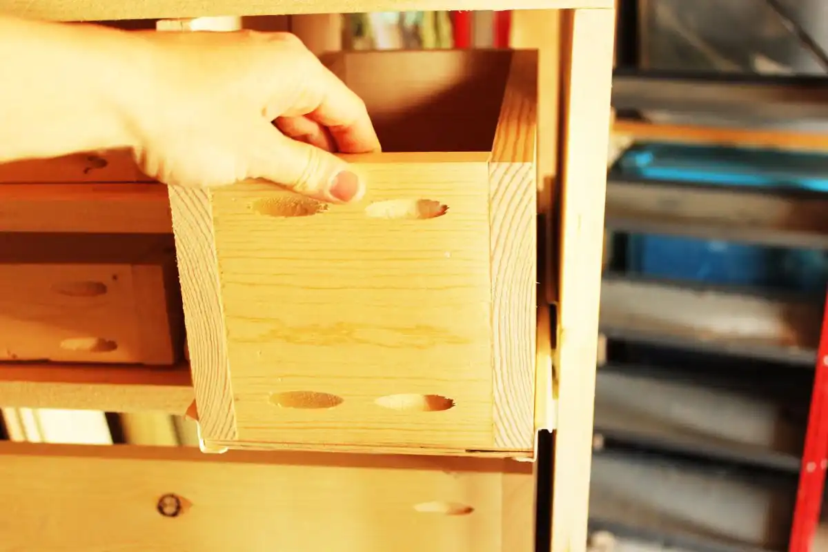 DIY Modern Wooden Dresser Roll the drawer into its rightful slot