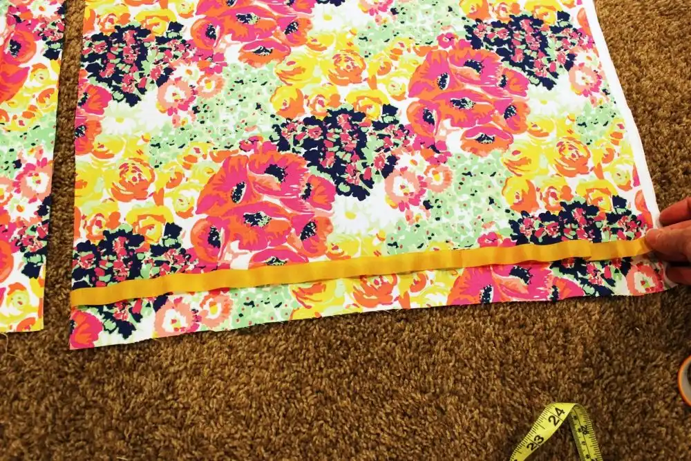 DIY Sew a Bolster Pillow lay down the fabric and meassure