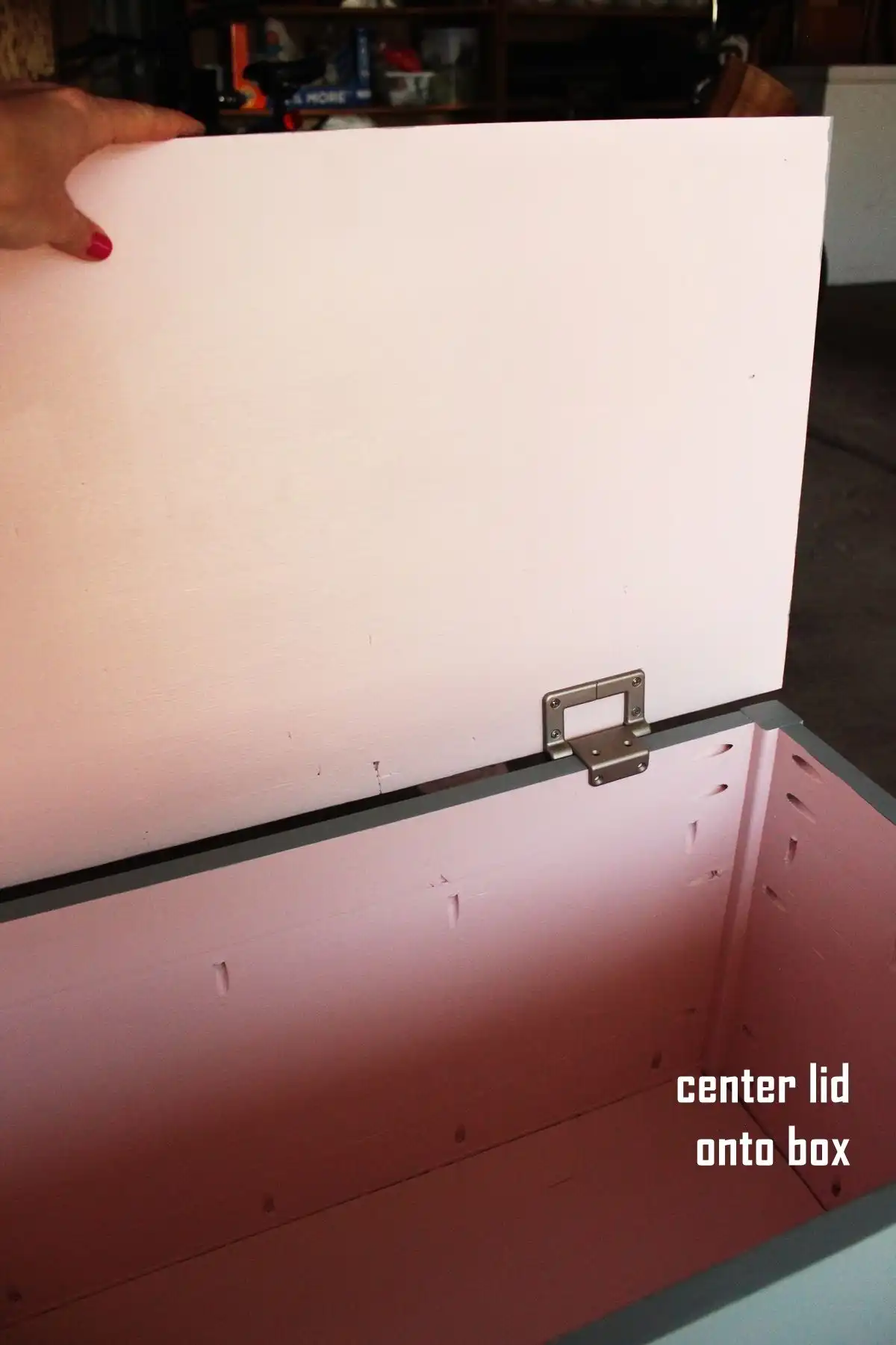 DIY Toy Box slide the hinges onto the back panel