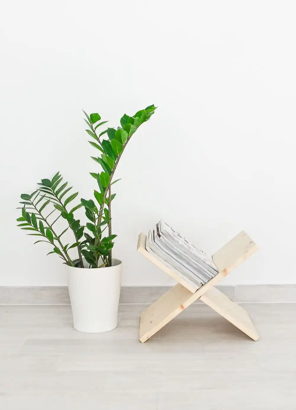 DIY wooden x shaped magazine rack