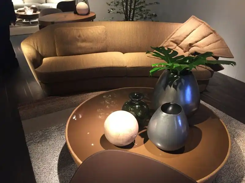 Decorate the coffee table with empty metalic vases