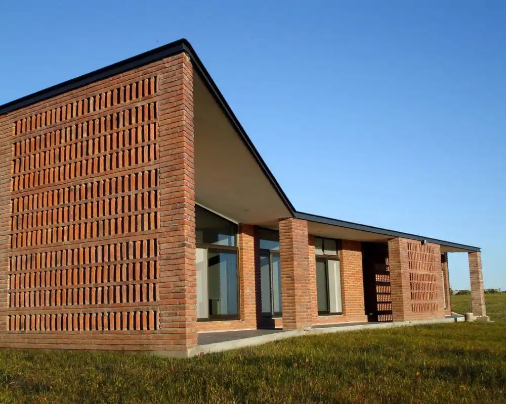 Diamante House With perforated bricks wall