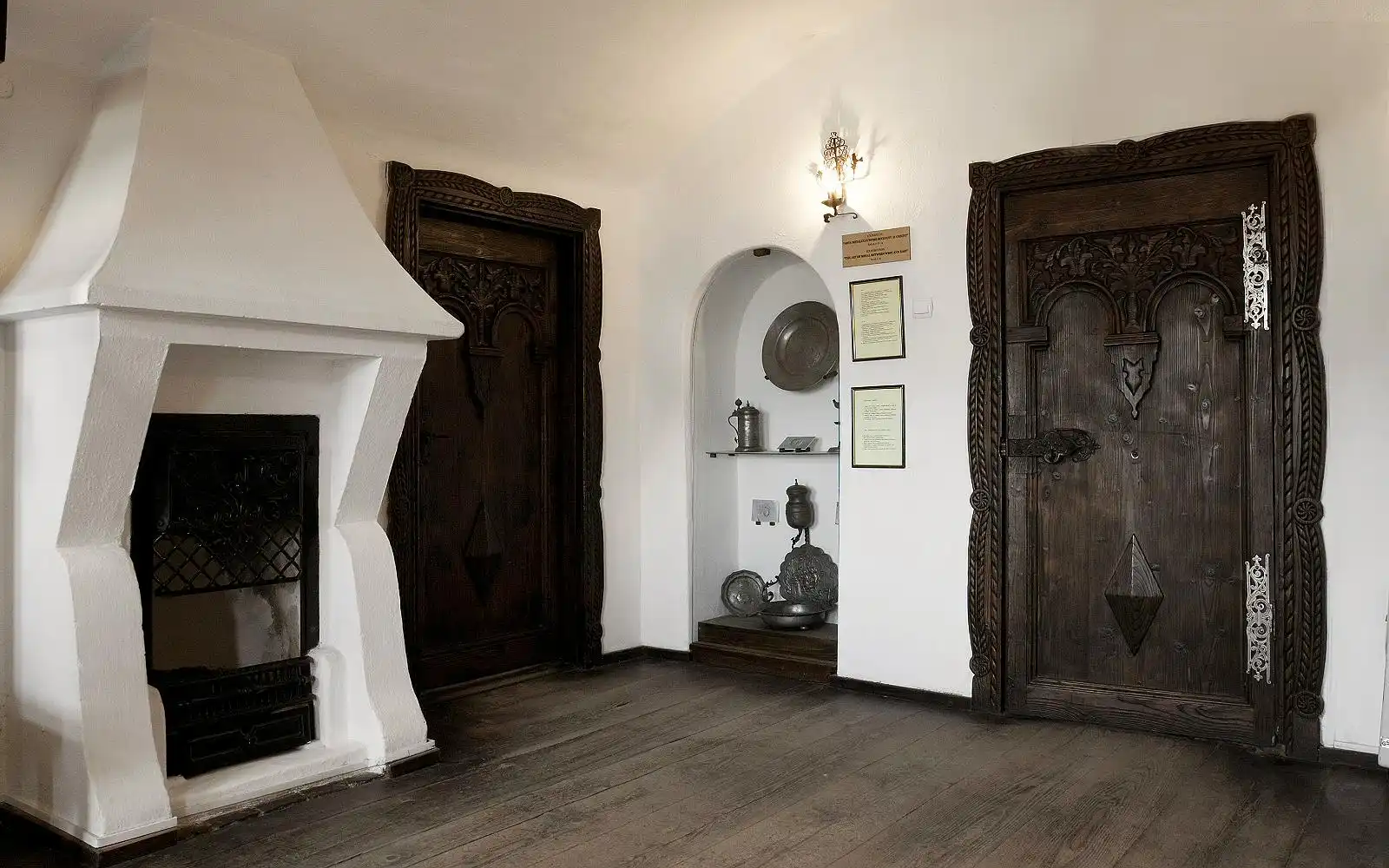 The living quarters are decorated in a more welcoming manner. using a lot of wood