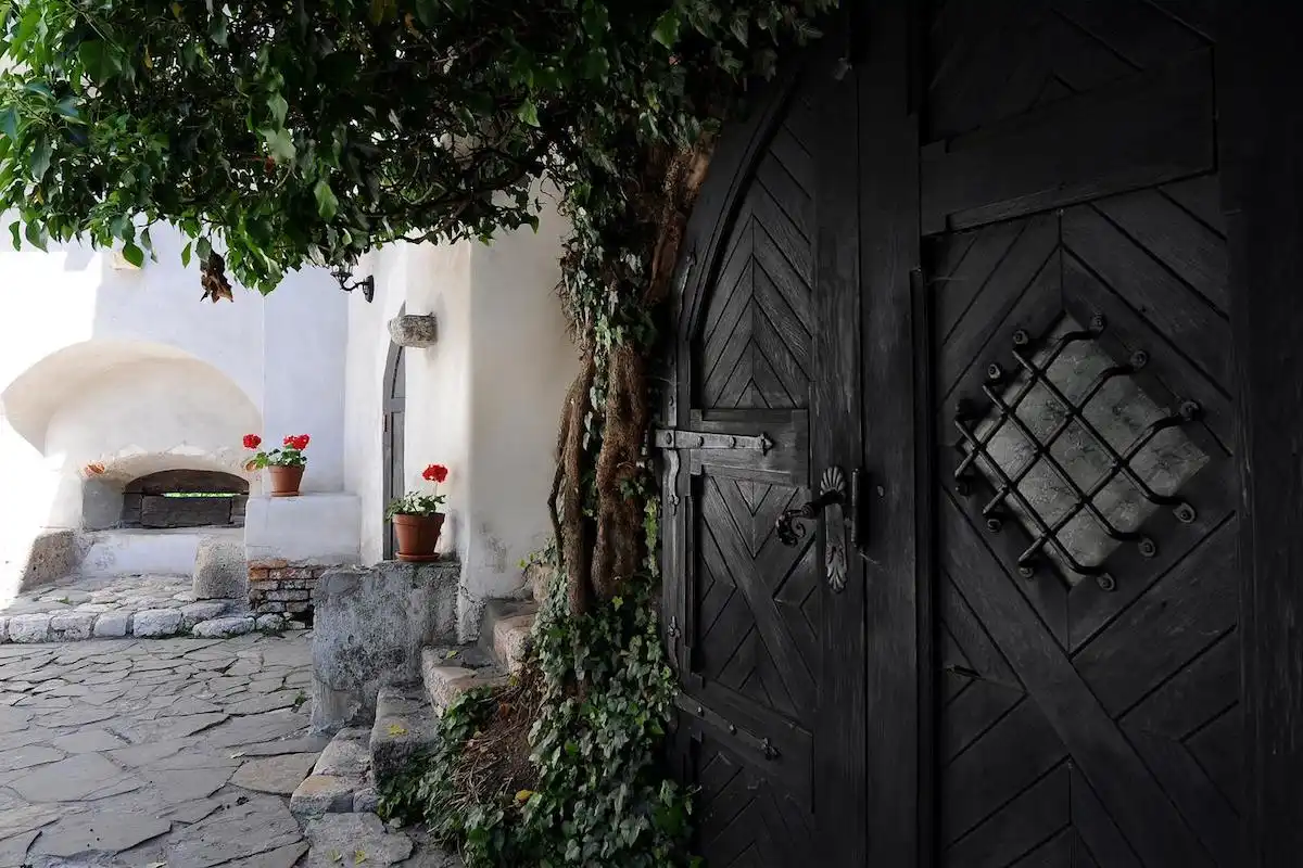 The inner courtyards have their own massive doors that offer access inside the castle