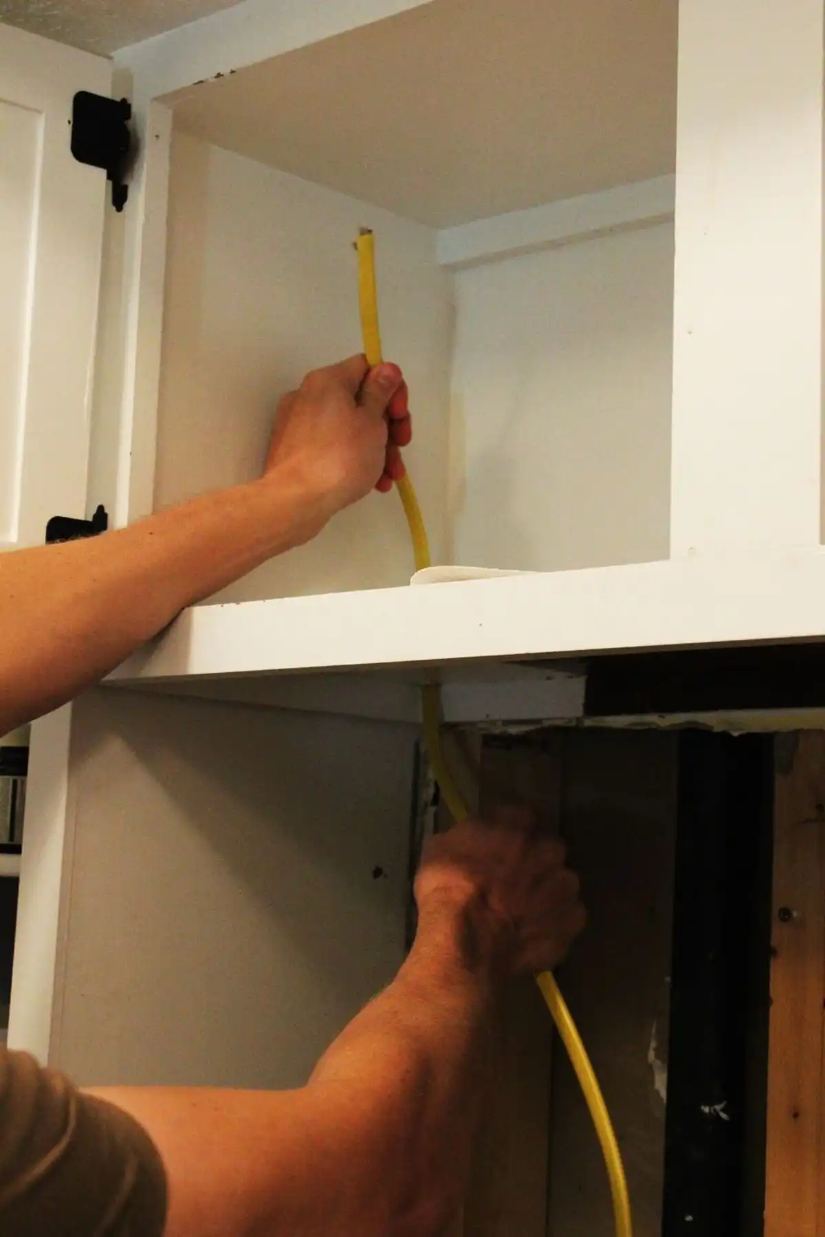 Drill a hole through the bottom