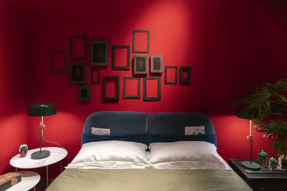 Empty frames above bed