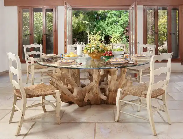 Eye catching table base with a round glass top
