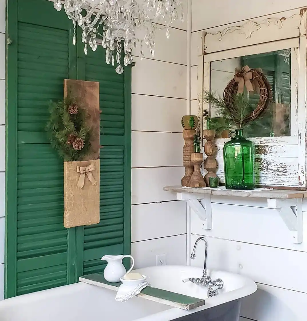 Farmhouse bathroom decor with wooden shutters