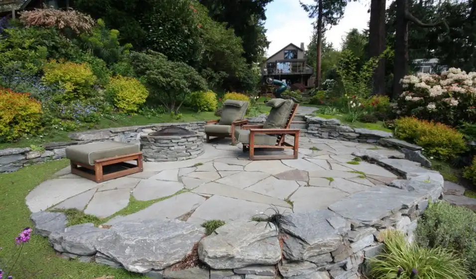This is a contemporary patio featuring organic lines and materials