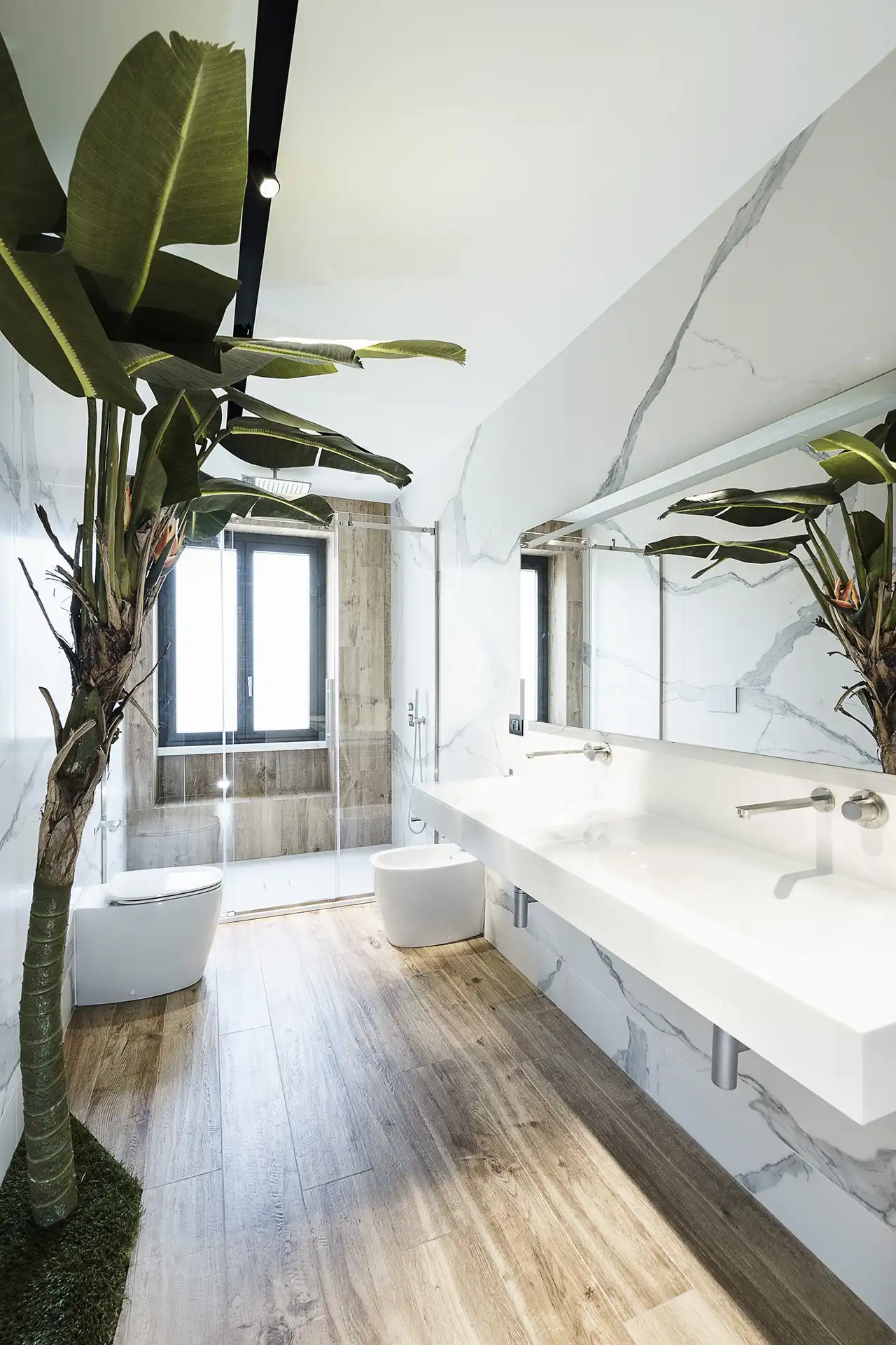 The floating vanity contributes to the roominess of the bathroom.