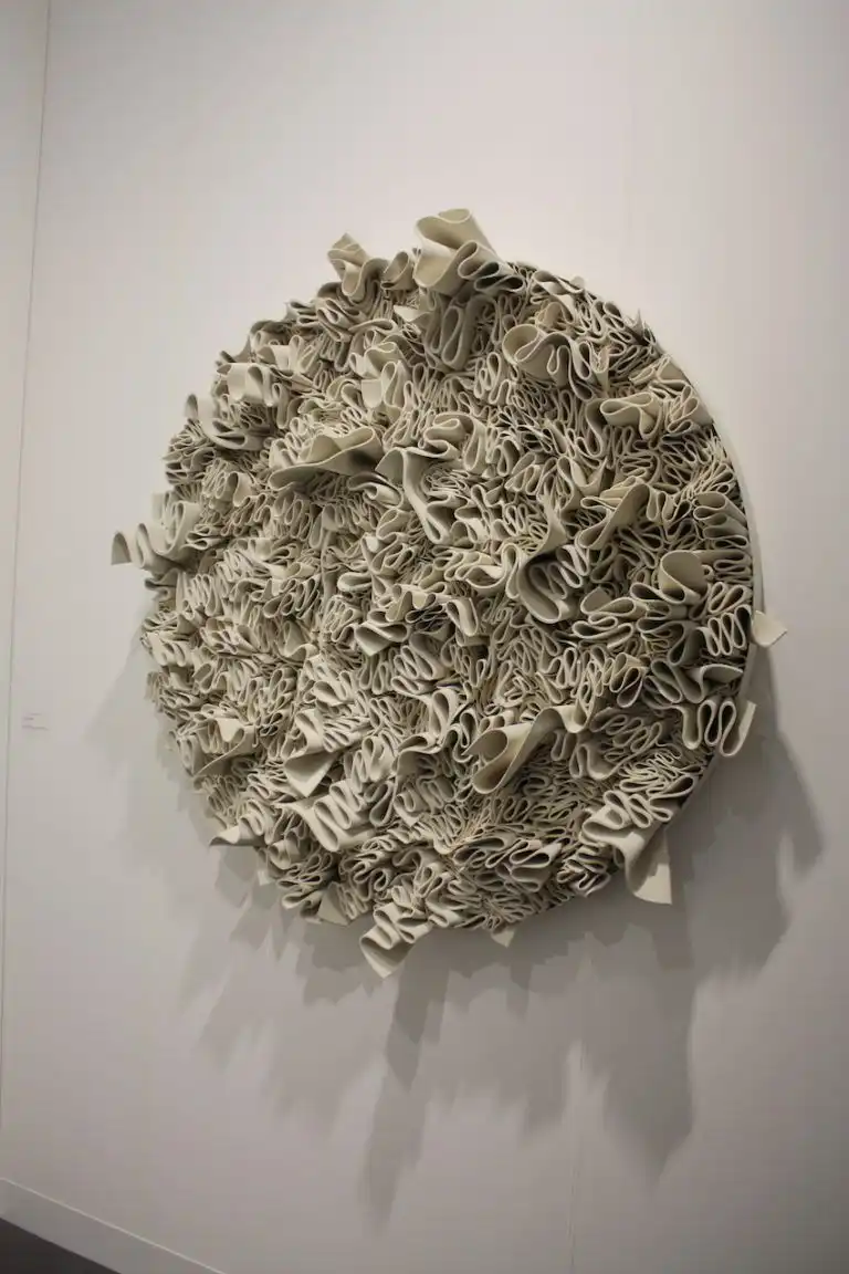 "Frappe" by Francesca Pasquale is neoprene on wood.