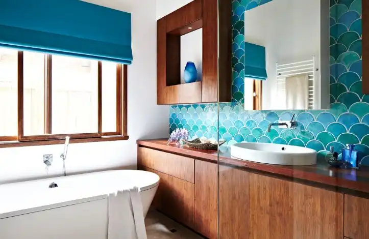 Freestanding bathtub and fish scale tiles for bathroom