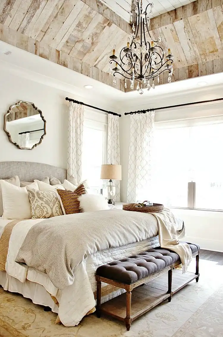French country linens tufted furniture with mirror above headboard