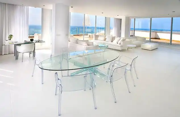 Full glass oval dining table