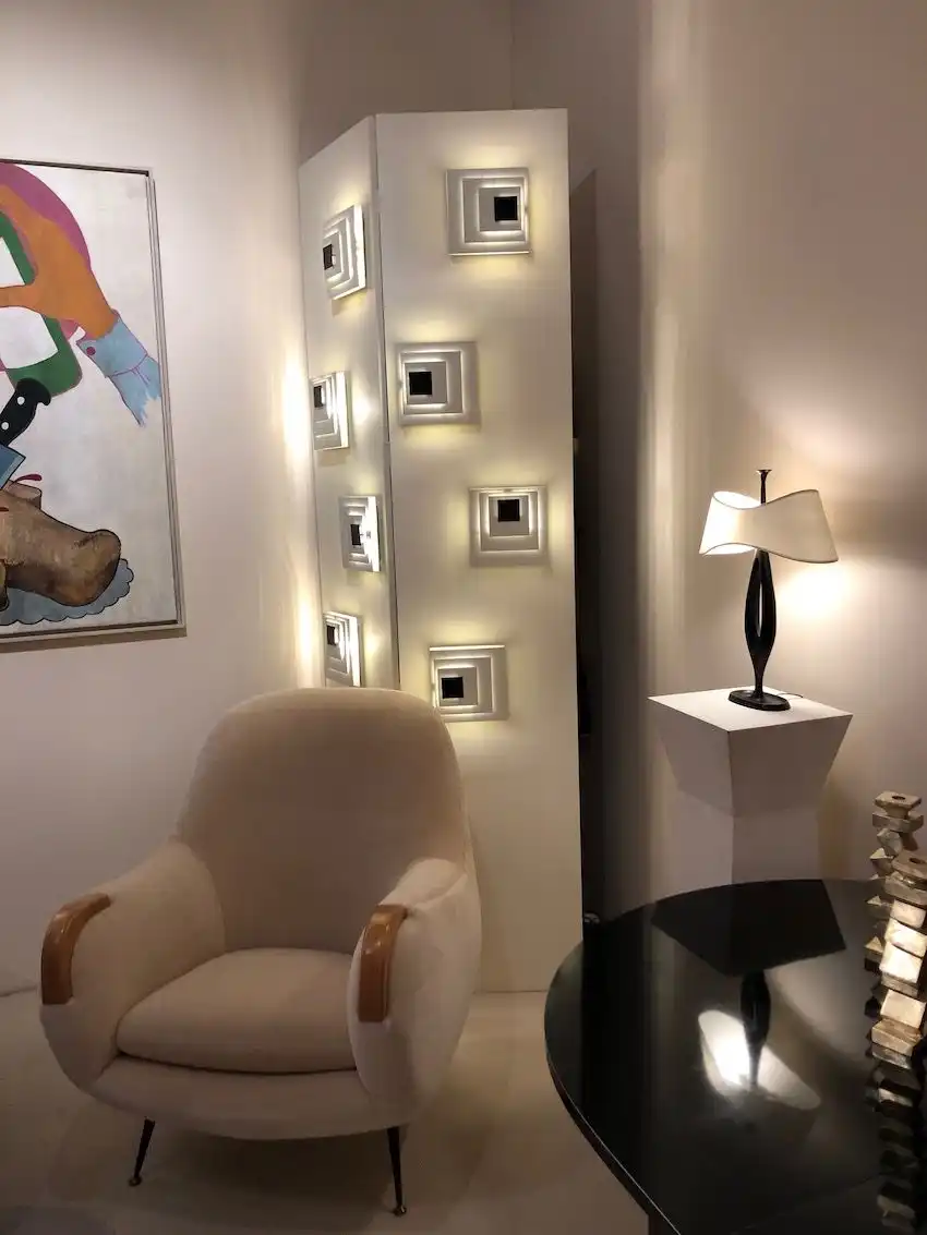 The wooden armrests are a nice accent on this armchair.