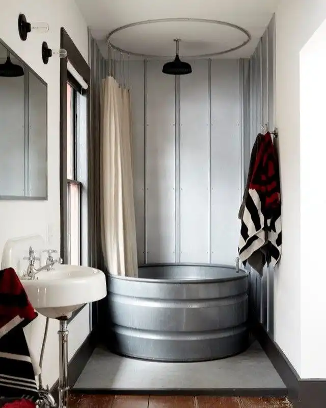 Galvanized round tub rustic industrial bathroom