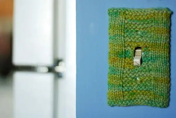 Garter strip light switch cover