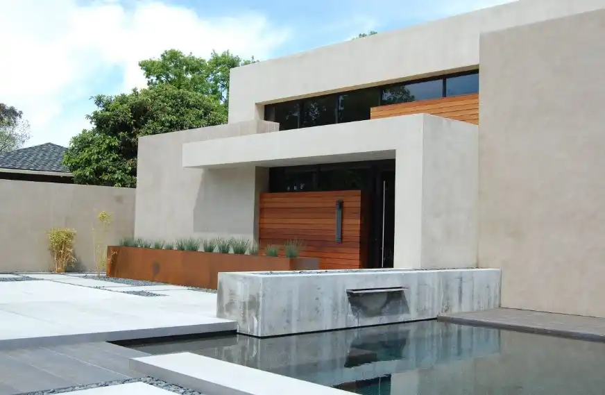 Geometrical modern house with corten large planter