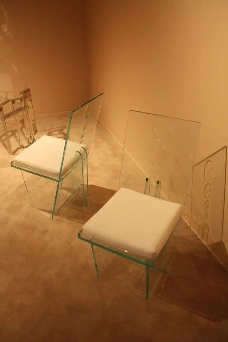 The chair is made from acrylic and polished nickel-plated steel and is offered by Michael Jon & Alan gallery.