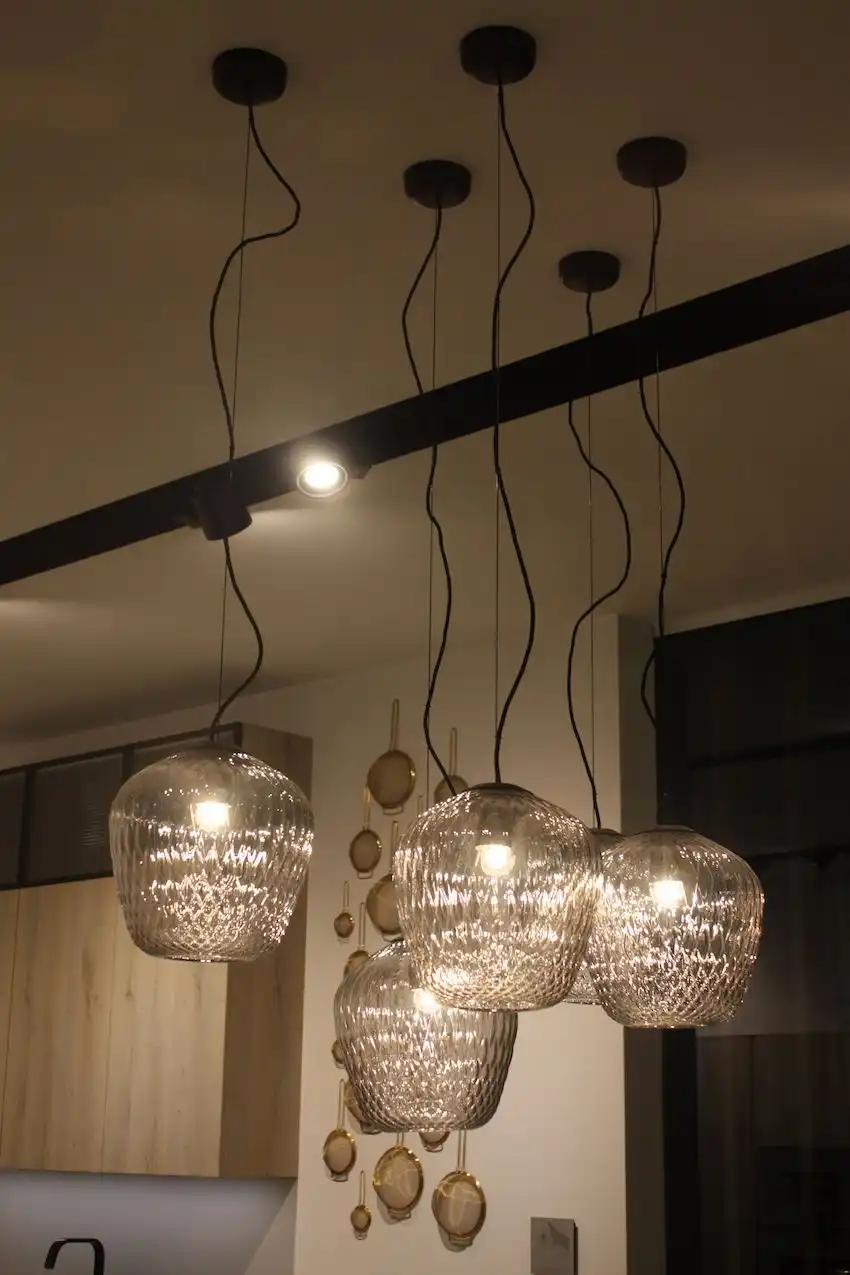 Doimo Cucine also displayed this clear glass grouping for kitchen island lighting.
