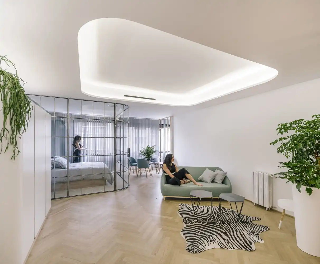 Glass walls and a light palette are ingenious elements used throughout the units.