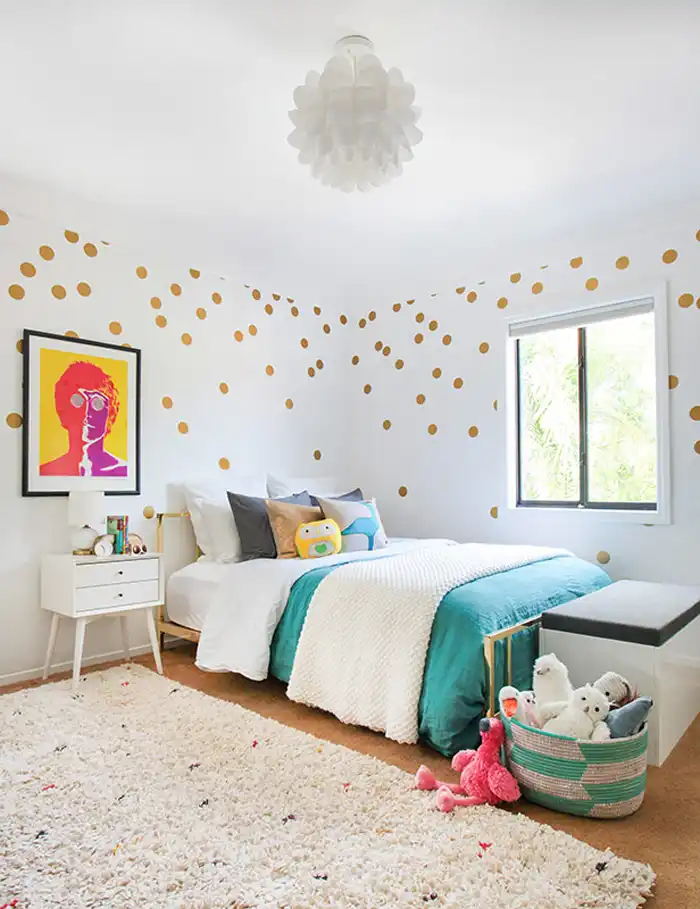 Gold polka dots on wall