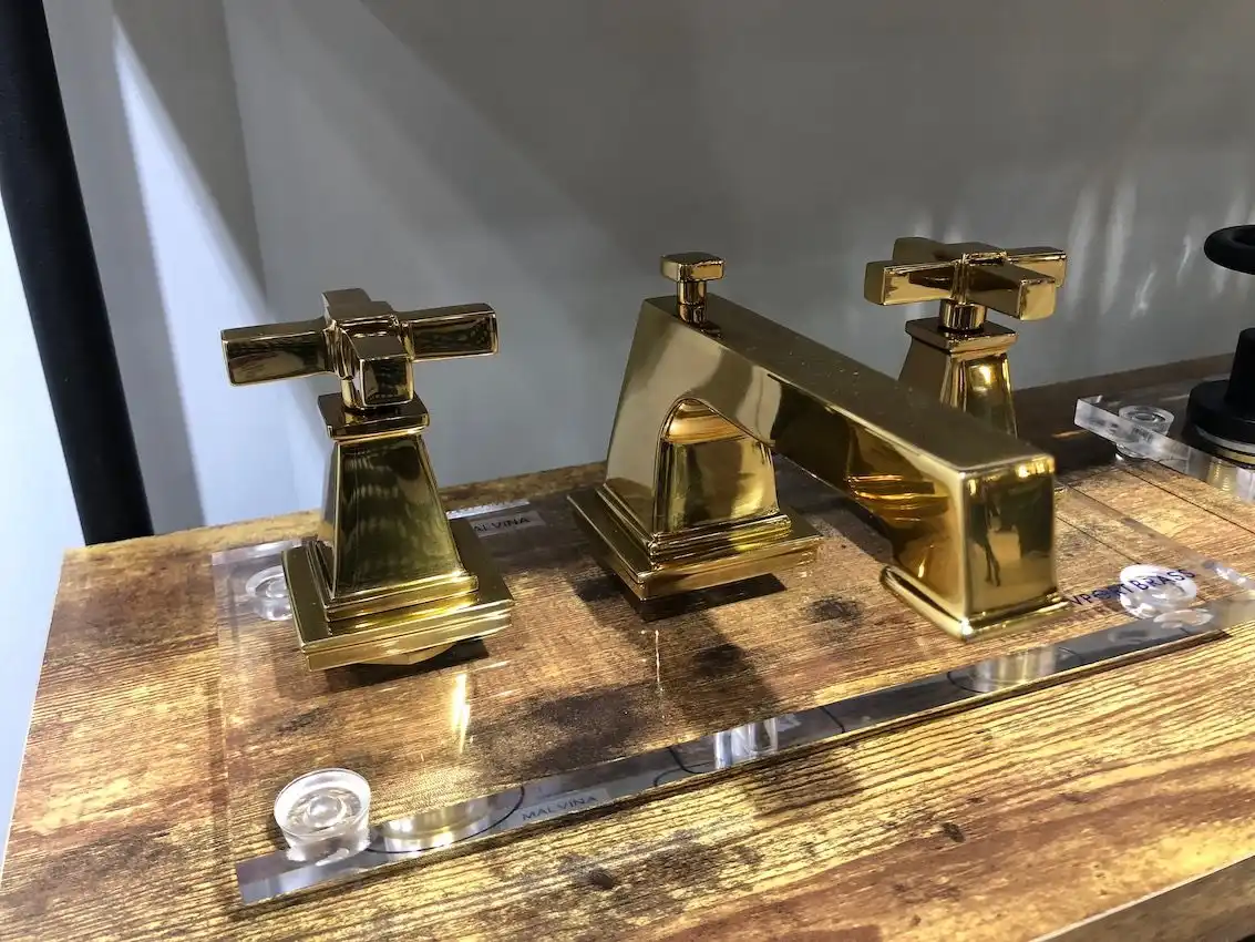 Gold tones are trending throughout the home for 2019 and the bathroom is no exception.