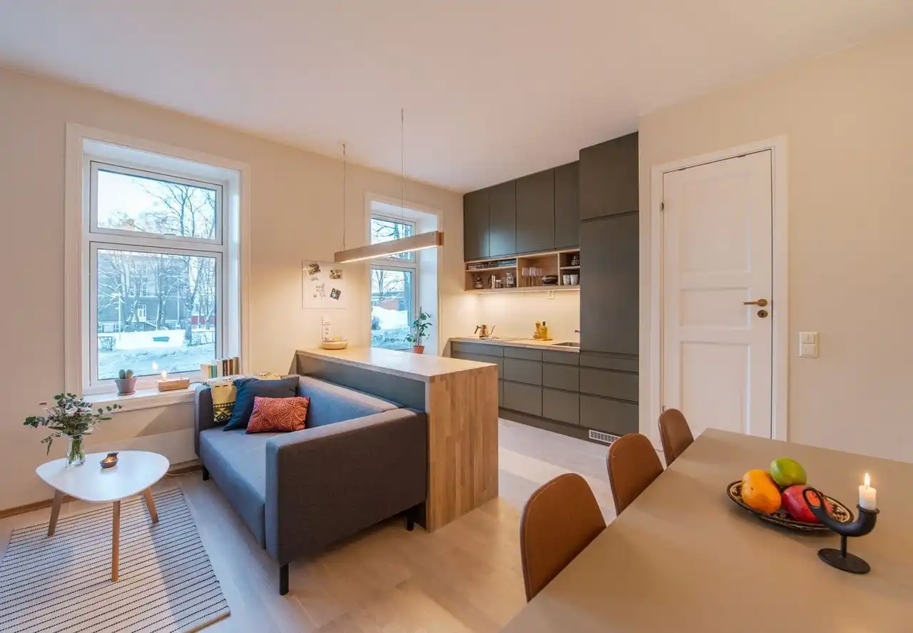 A big kitchen island that doubles as a bar