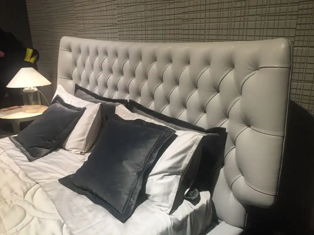 Gray tufted headboard design