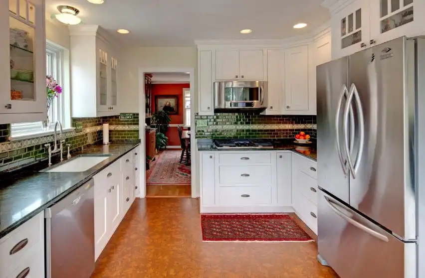 Green subway tiles for backsplash and cork floor