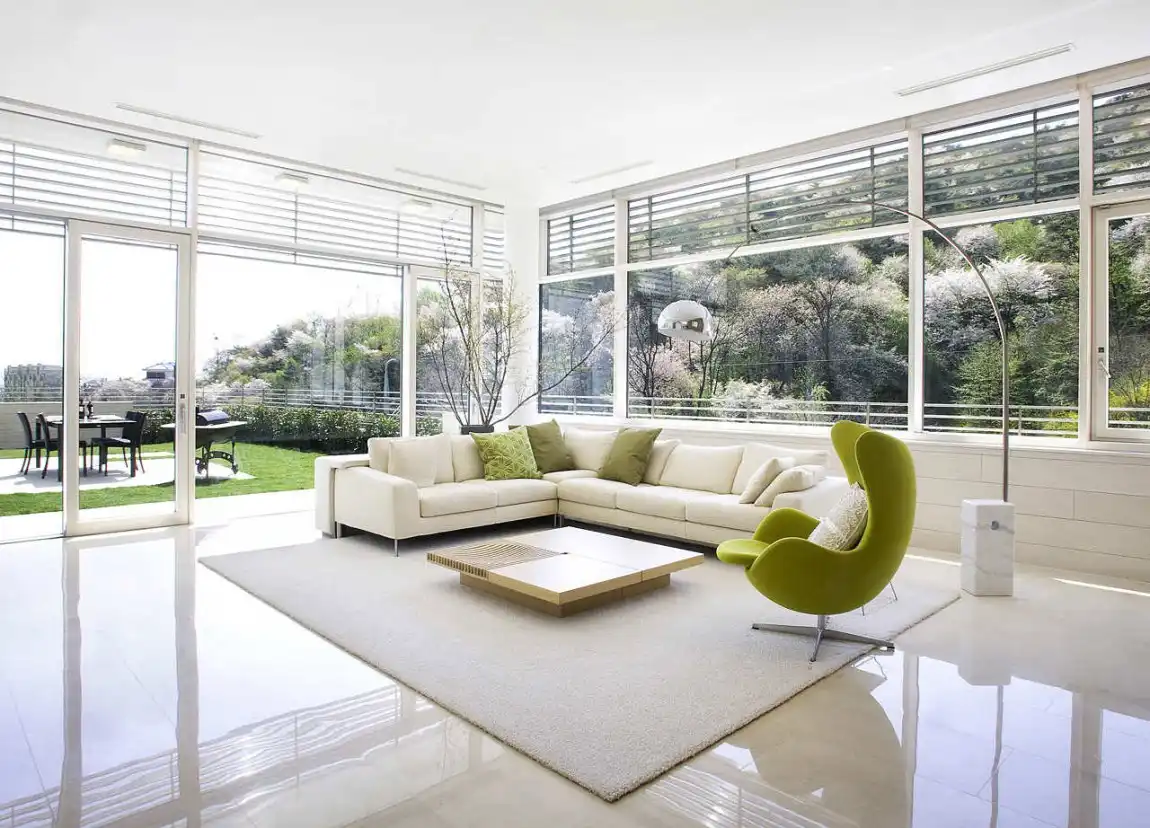 Green upholstered Arne Jacobsen Egg Chair