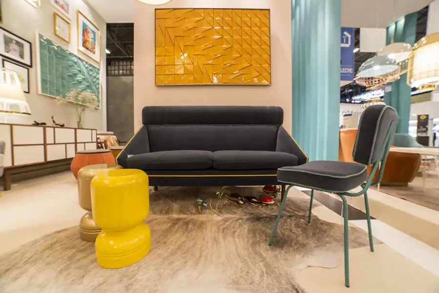 Grey couch with a yellow strip