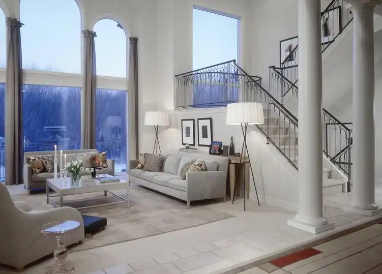 Grey inspired living room with symmetric placed tripod lamps