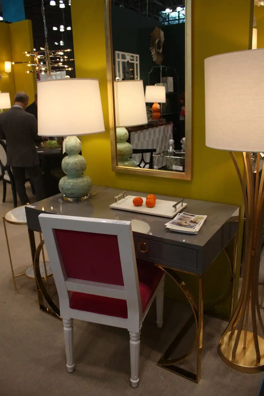 Grey is as undertone does desk and gold floor lamp