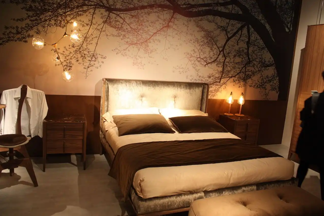 A large piece of art or mural can also ground the bed in the space, as in this Hebanon arrangement.