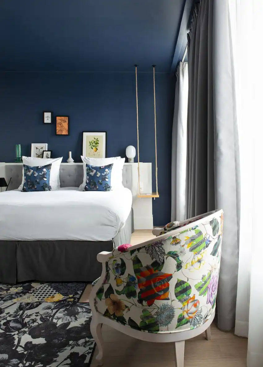 Printed upholstery and rugs add vibrancy to the rooms without overpowering the calm atmosphere.