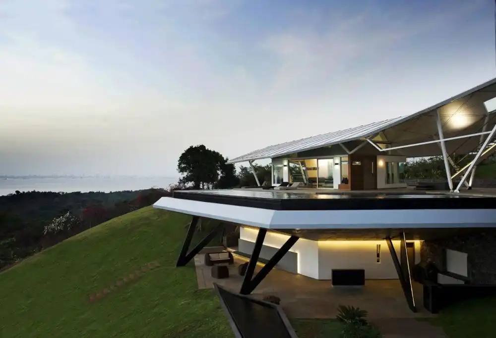 House at Alibag by Malik Architecture with Pool