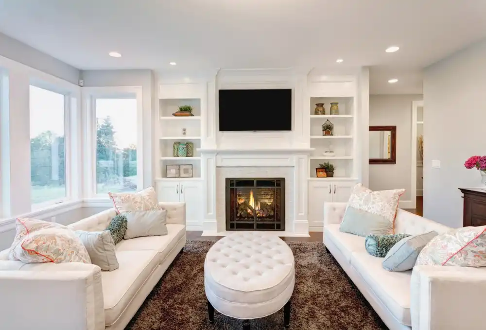 How high should a TV be mounted above a fireplace