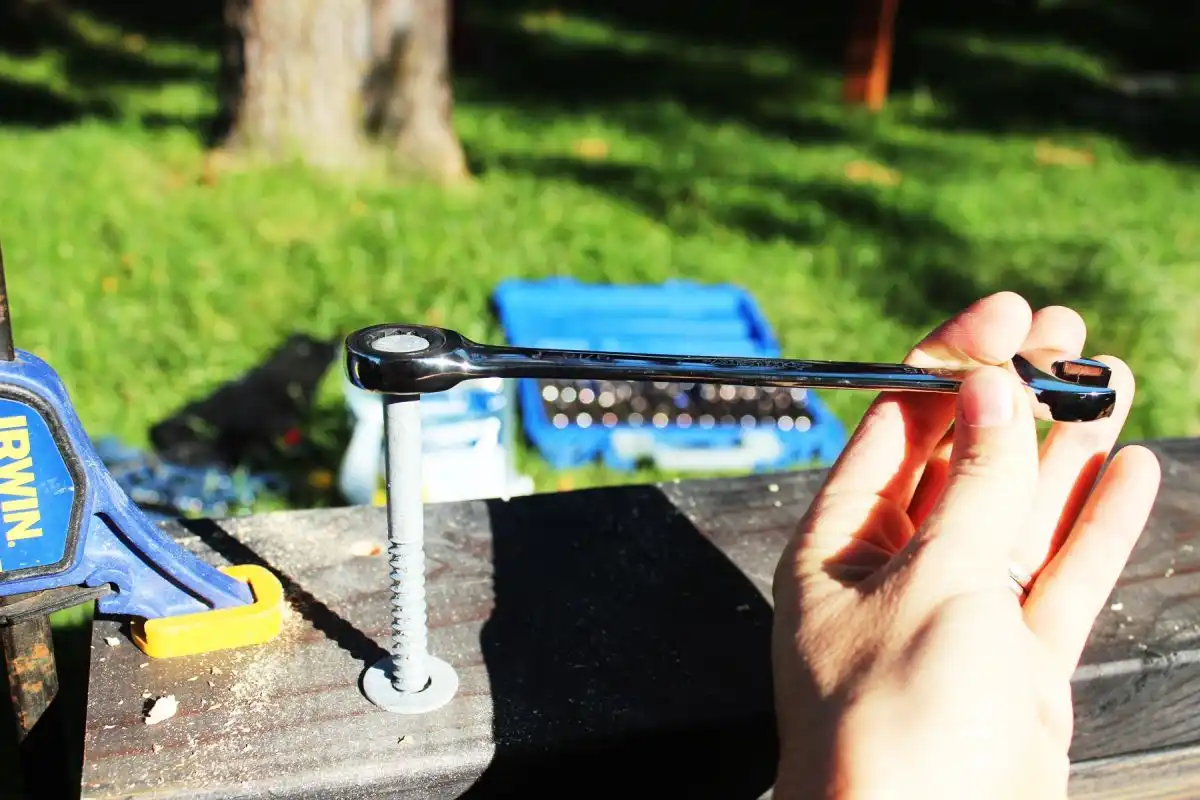 How to Wall-Mount a Pergola Frame - boards on surface