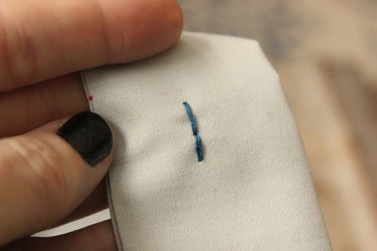 How to Sew - Pull the whole needle and thread through