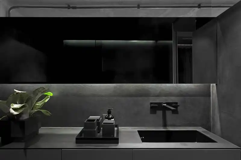 Industrial Sao Paulo loft bathroom sink and mirror