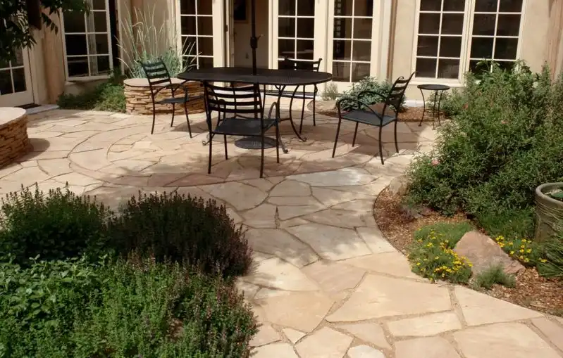 The irregular and unique shape of each flagstone makes this a great choice for organic-shaped patios [ From WaterWise Landscapes Incorporated ]