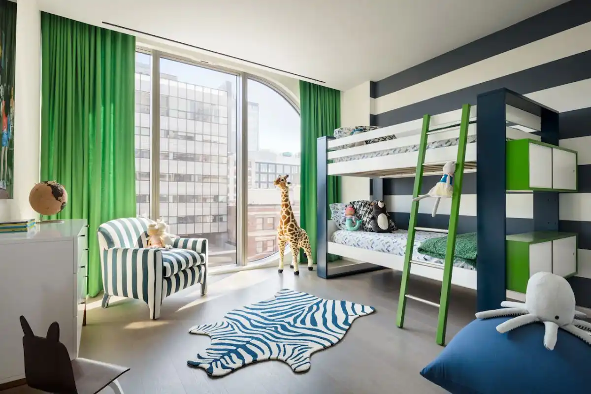 The kids' bedroom is a sophisticated, yet child-friendly design.